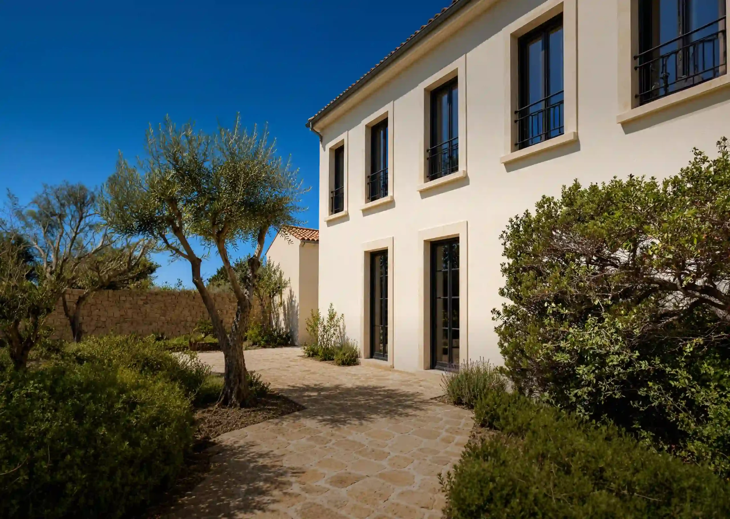 Travaux d'isolation thermique par l'extérieur ITE sur la façade d'une maison